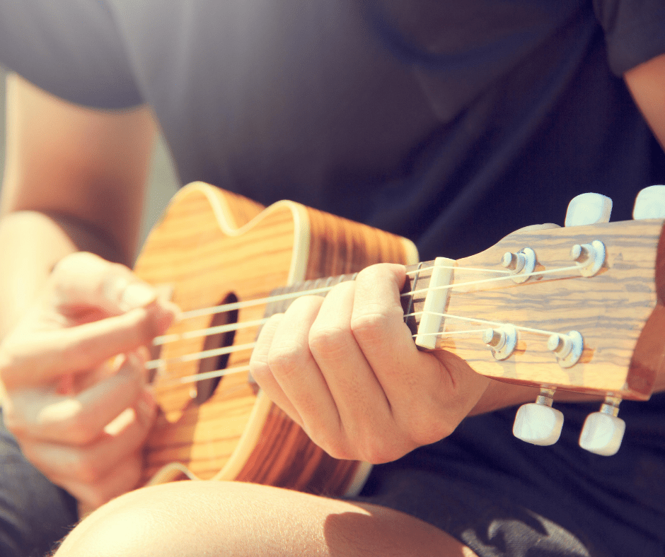 Playing the ukulele