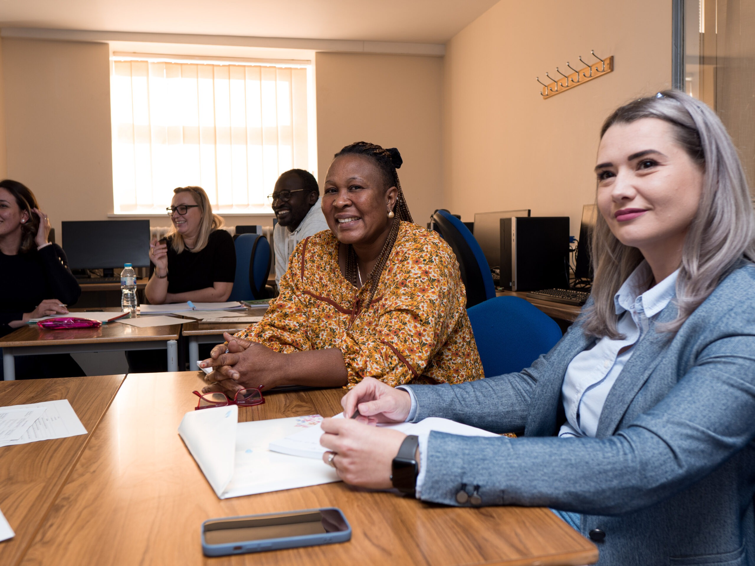 Learners sitting at table