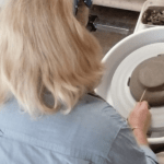 Learner using pottery wheel