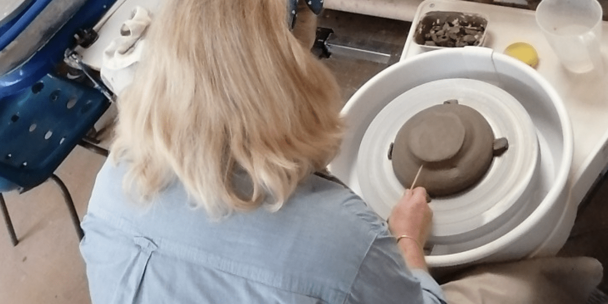Learner using pottery wheel