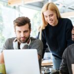 Group of people working on laptop