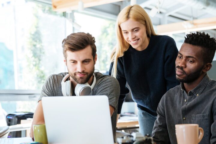 Group of people working on laptop