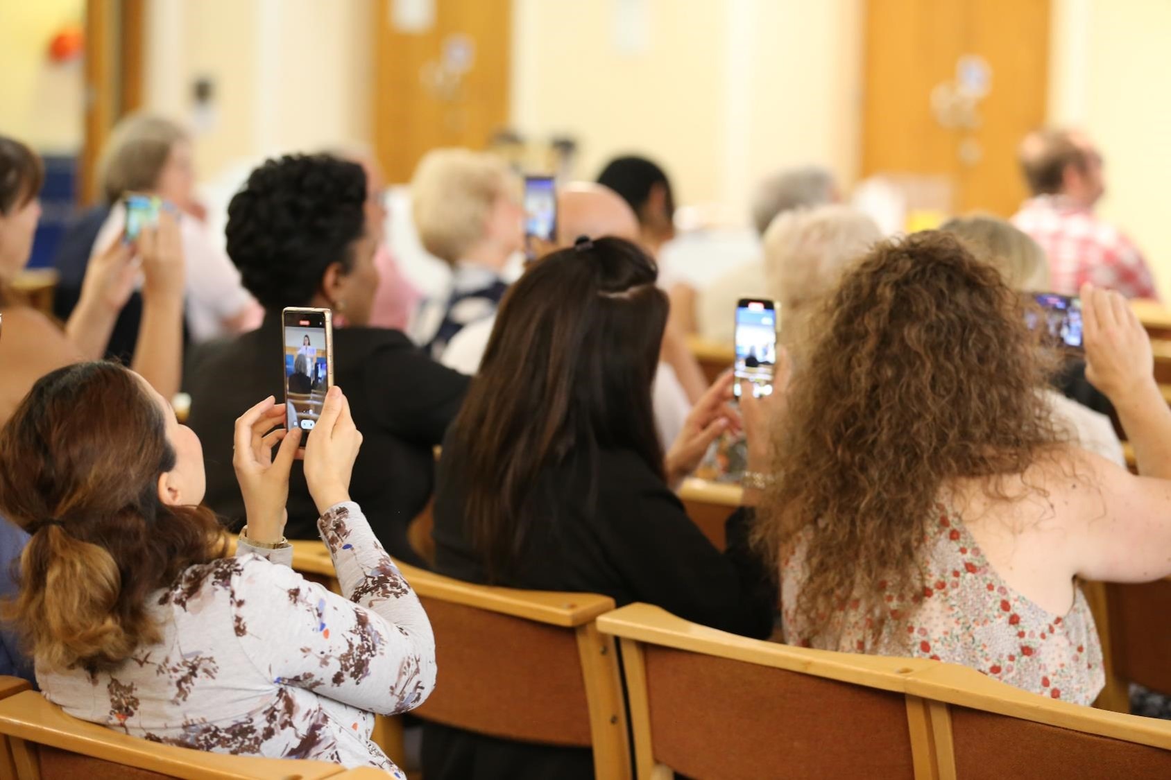 People taking photos at the awards