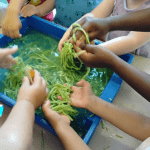 PlayingWithGreenPasta Children Playing With Green Pasta